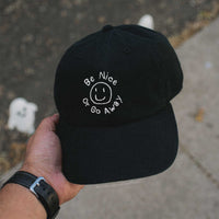 Be Nice or Go Away Saying with Smiley Embroidered Dad Hat